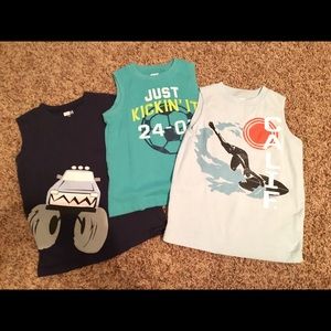 Bundle of 6 assorted muscle tees. Boys size 5.