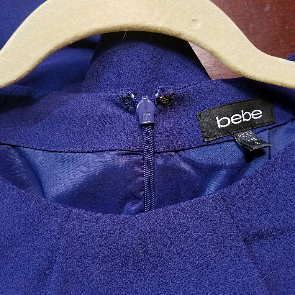 👗bebe peplum cap sleeve dress👗