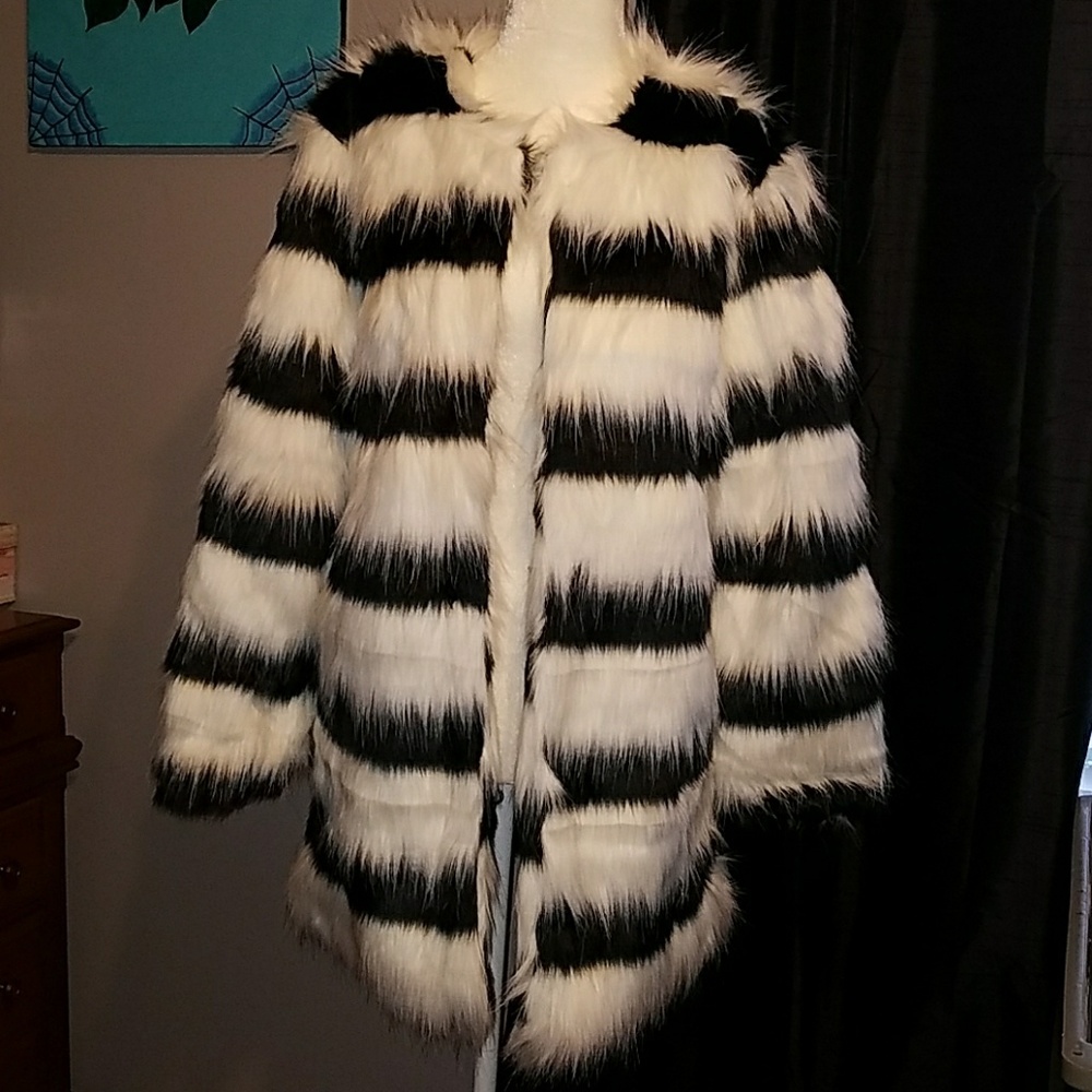 Mid length black and white Faux fur coat