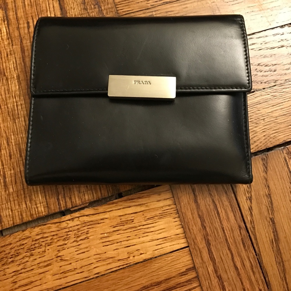 Authentic Prada black trifold wallet.