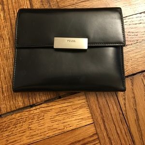 Authentic Prada black trifold wallet.