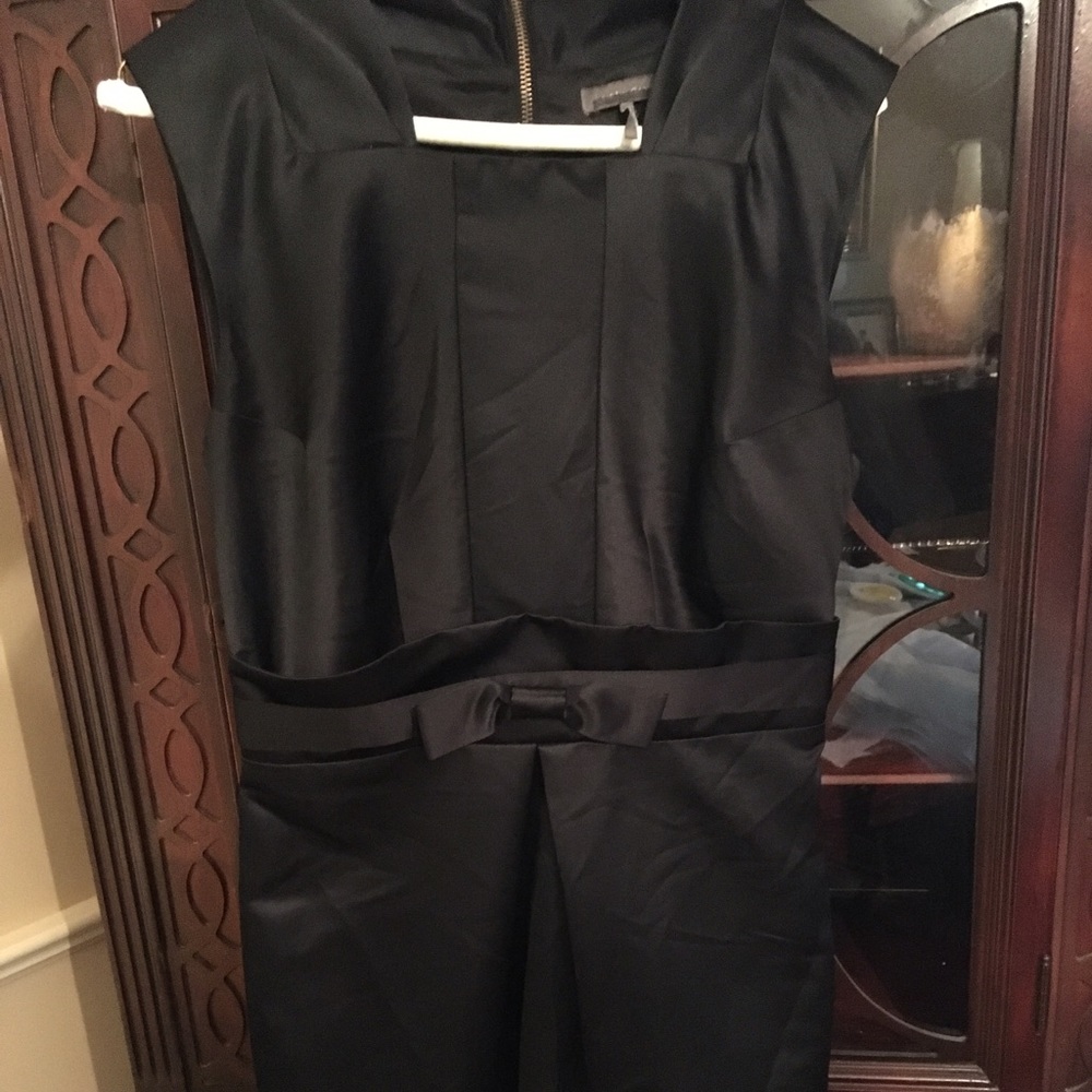Black cocktail/party dress with back zip top!