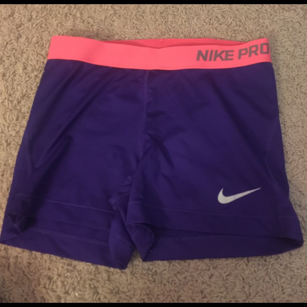 Adult large purple and coral Nike Pros