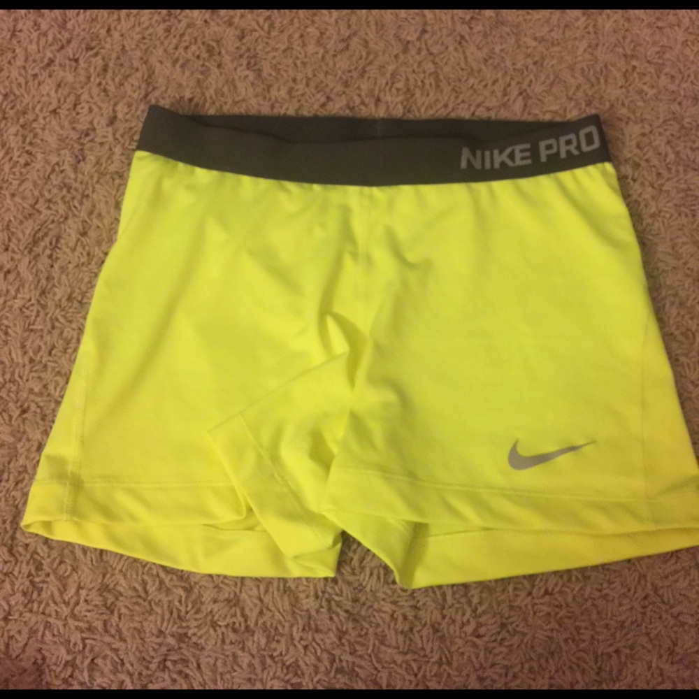 Adult large neon yellow Nike Pros
