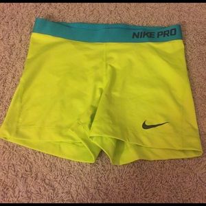 Adult large lime greenish yellow Nike Pros