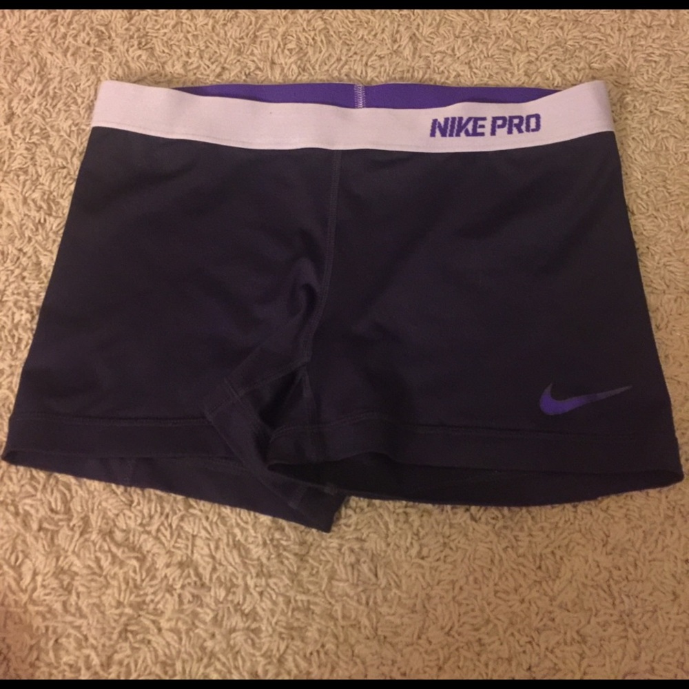 Adult large 2.5 inch purple Nike Pros