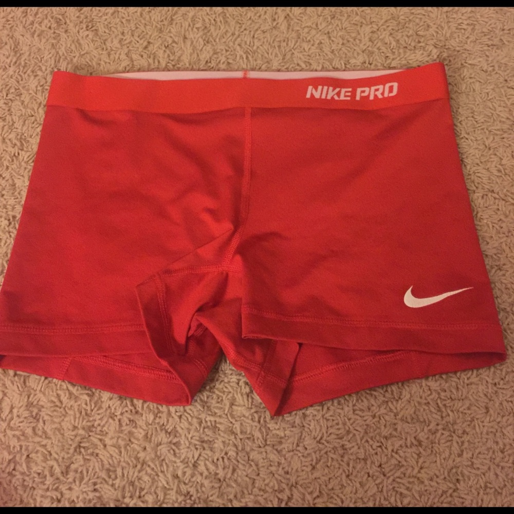 Adult large 2.5 inch red Nike Pros
