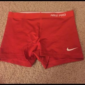 Adult large 2.5 inch red Nike Pros
