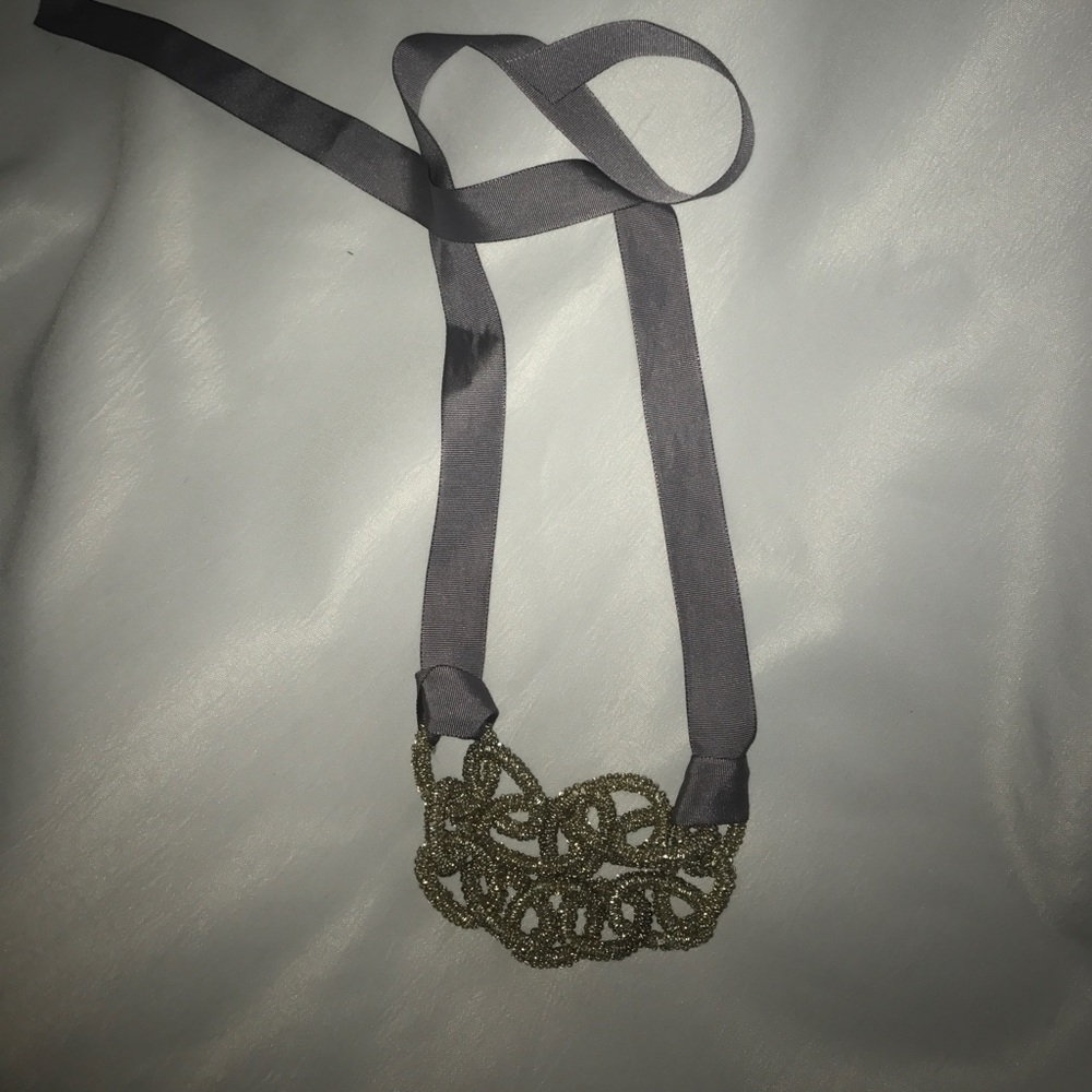 Adorable necklace with grosgrain ribbon closure