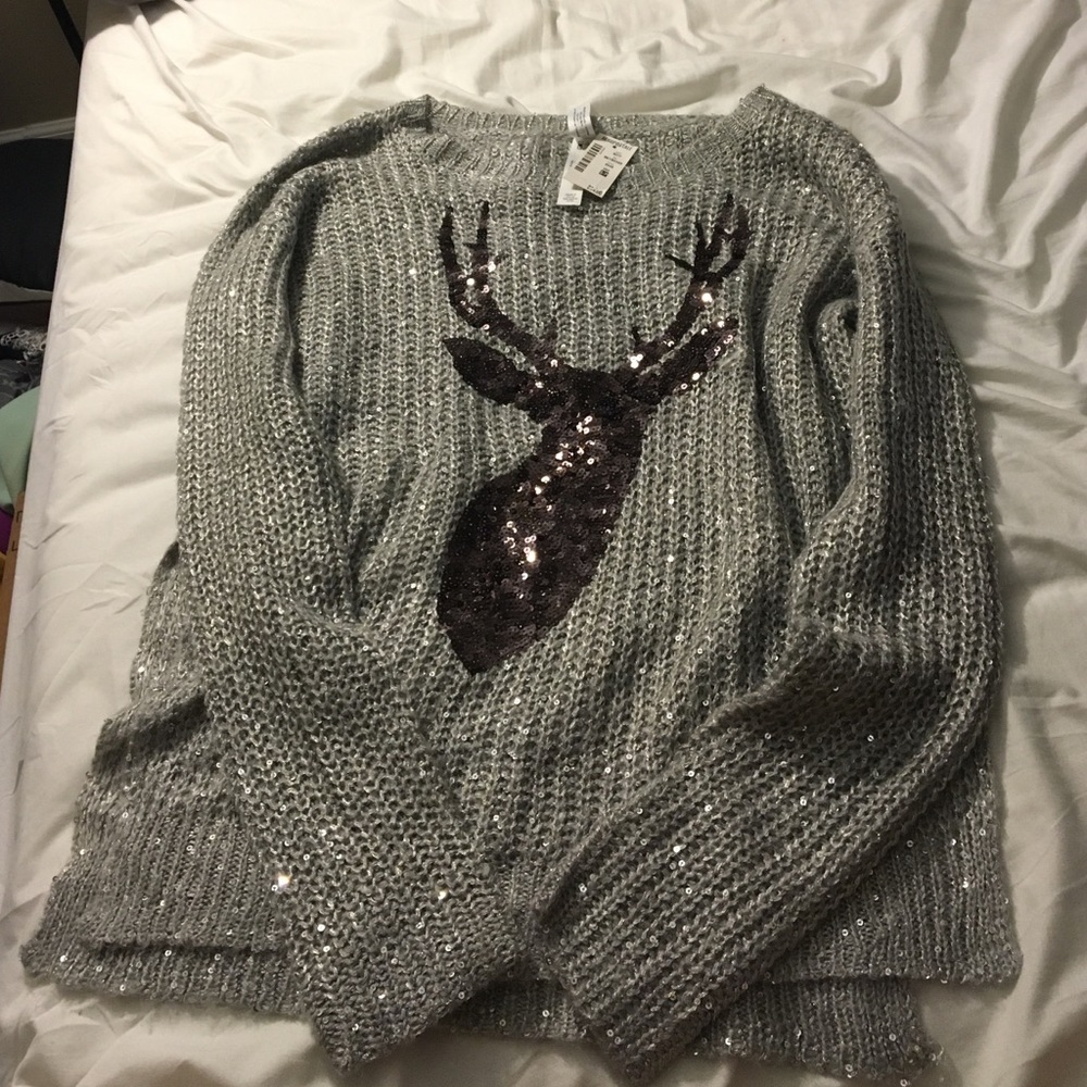 Silver sweater with deer