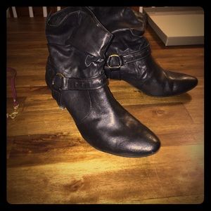 Black heeled booties by Easy Spirit