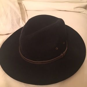 black hat w brown leather around the hat