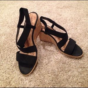 Black stretch wedge sandals