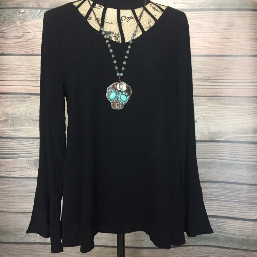 Black cut out blouse with bell sleeves