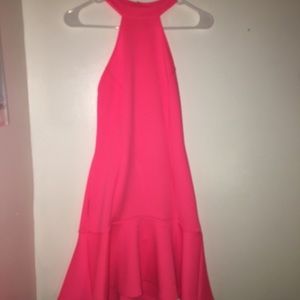 Bright pink dress size S with strappy back.