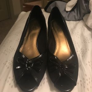 Classy black peep toe dress shoes.