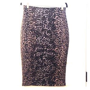 Short leopard print skirt.
