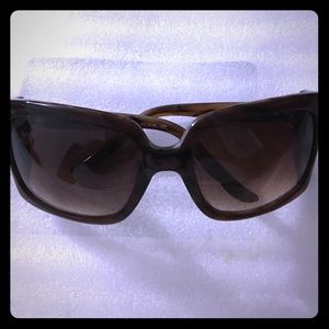 Oscar de la renta brown sunglasses.