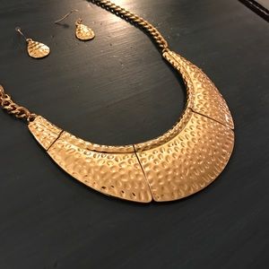 Gold statement necklace with matching earings