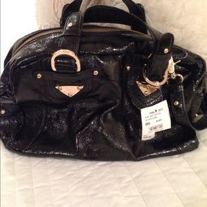 Charles David crinkled patent leather handbag.
