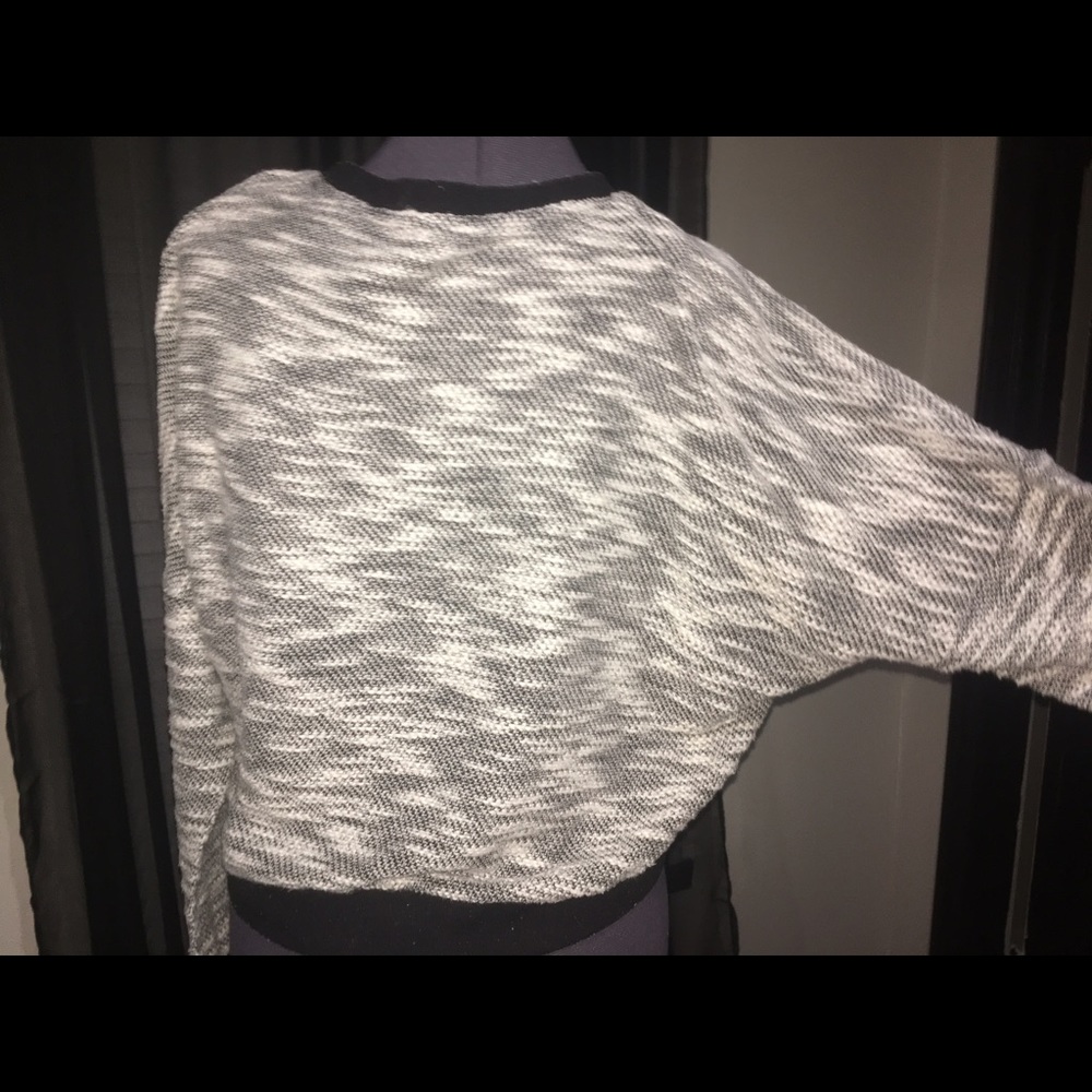 Grey knitted looking Sweater with Black cuffs