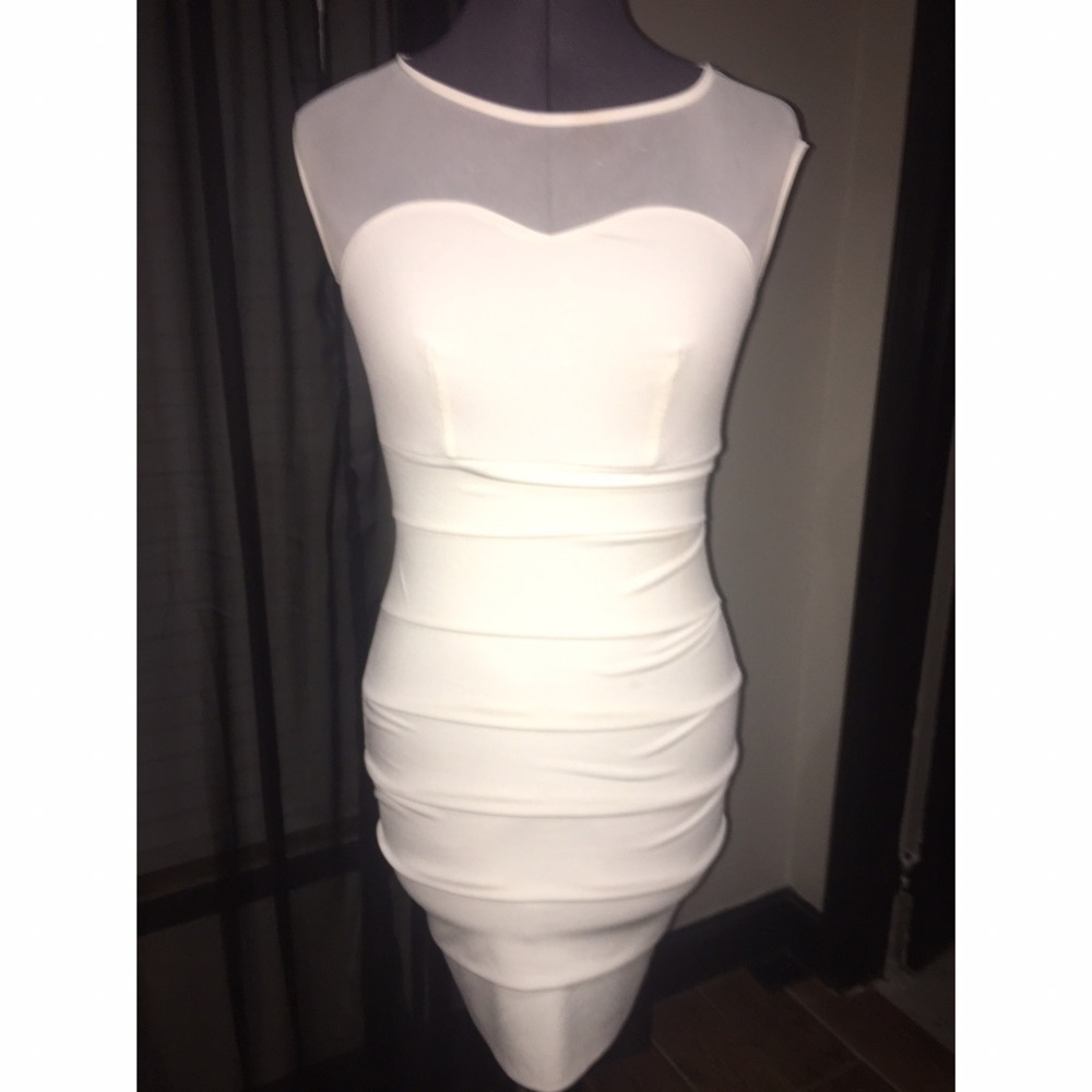 White fitted dress, Has ruffles and mesh