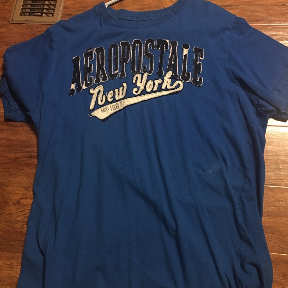 Men's shirt sz X-L does have a small spot on front