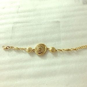 Yellow gold plated bracelet with crystals.