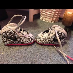 Nike baby shoes pink and black