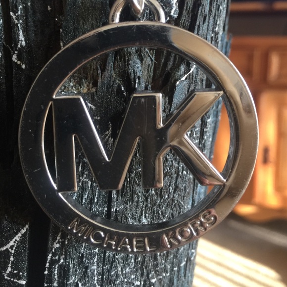 Michael Kors Accessories - MK key chain 2" across and 5" long