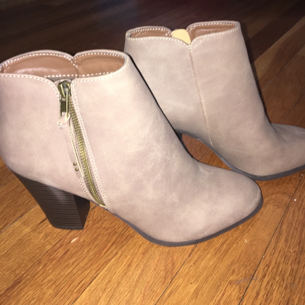 Taupe booties, never worn.