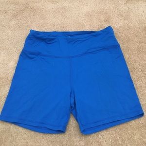 90 degree bright blue spandex shorts