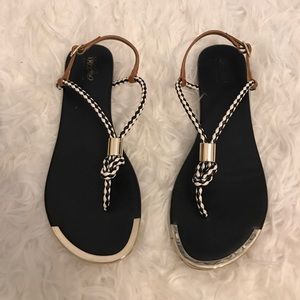 Black and White Sandals With Hints of Gold