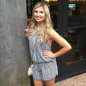 Striped romper with halter tie and open back