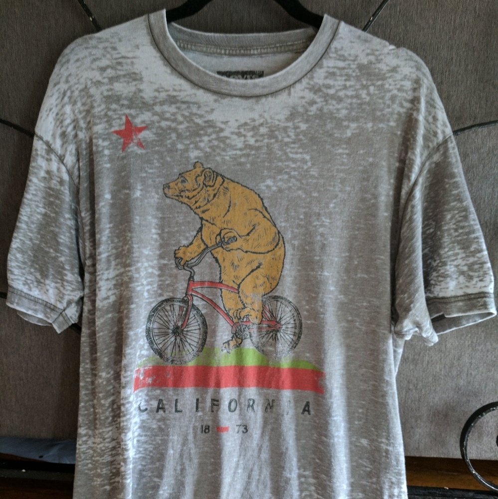 Levi's tee with bear riding a bicycle
