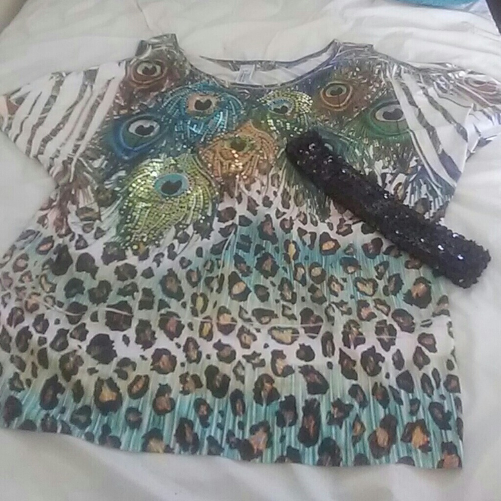 Peacock leopard print tunic and black belt