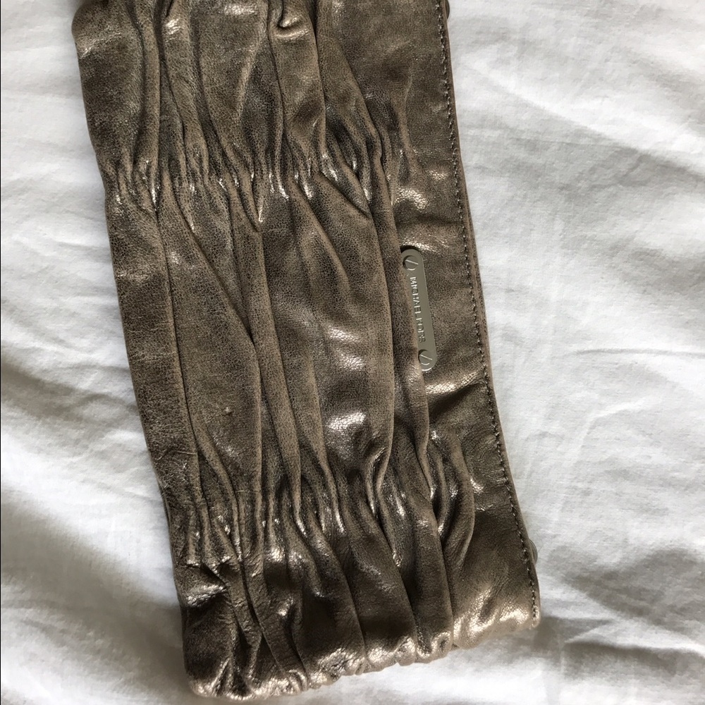 Michael Kors golden clutch