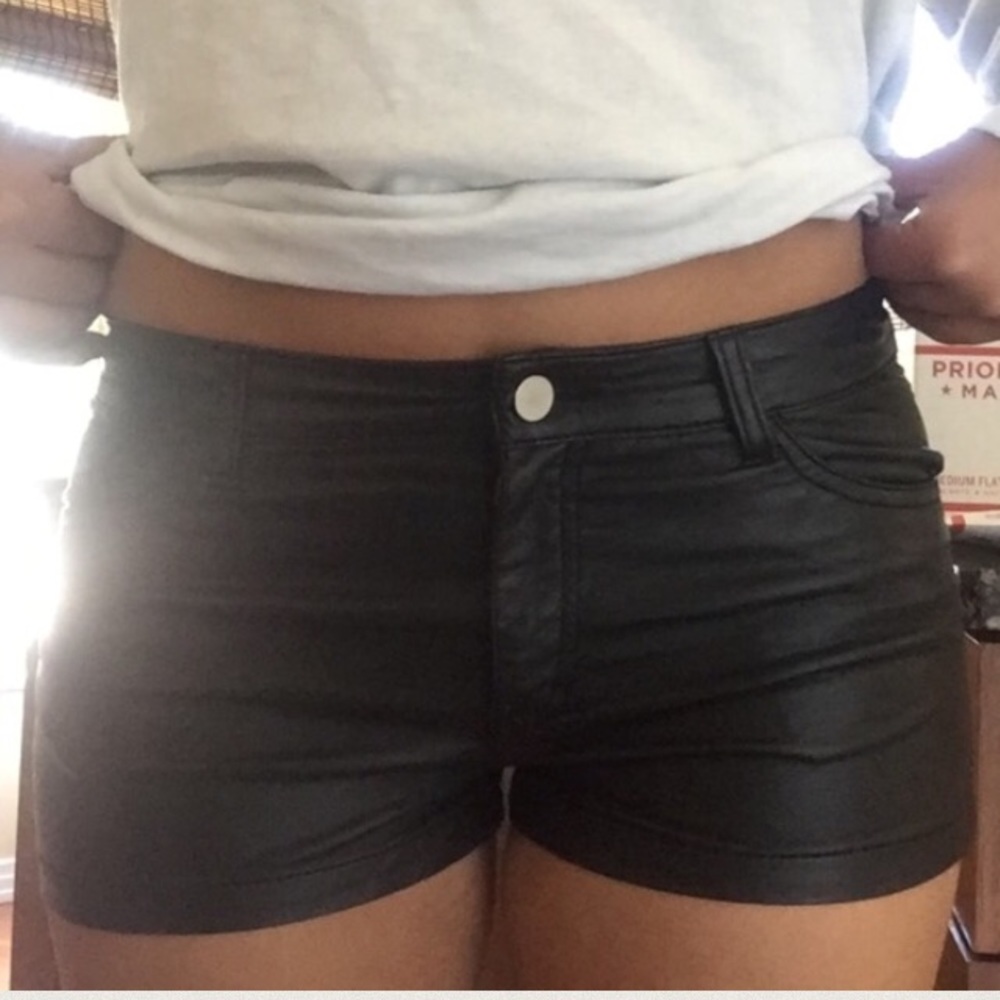 Black faux leather short by H&M, size 6