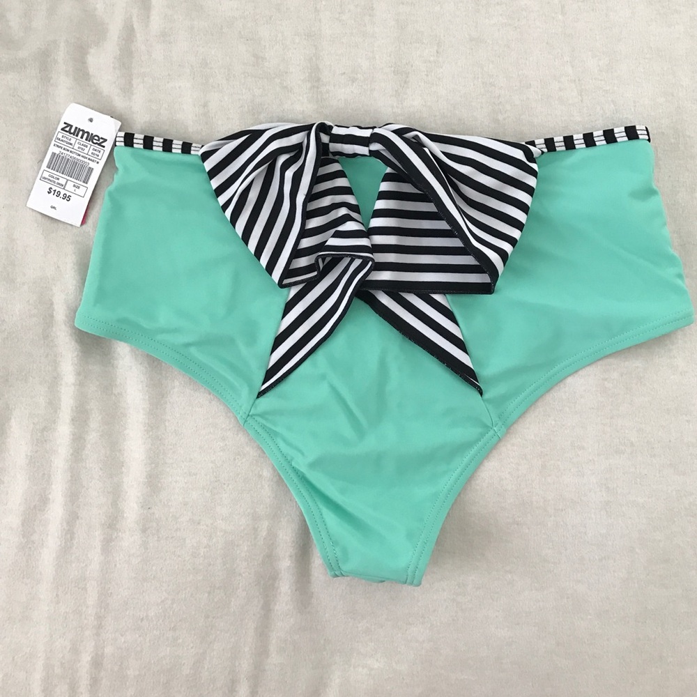 High waisted swim suit with bow detail on back!