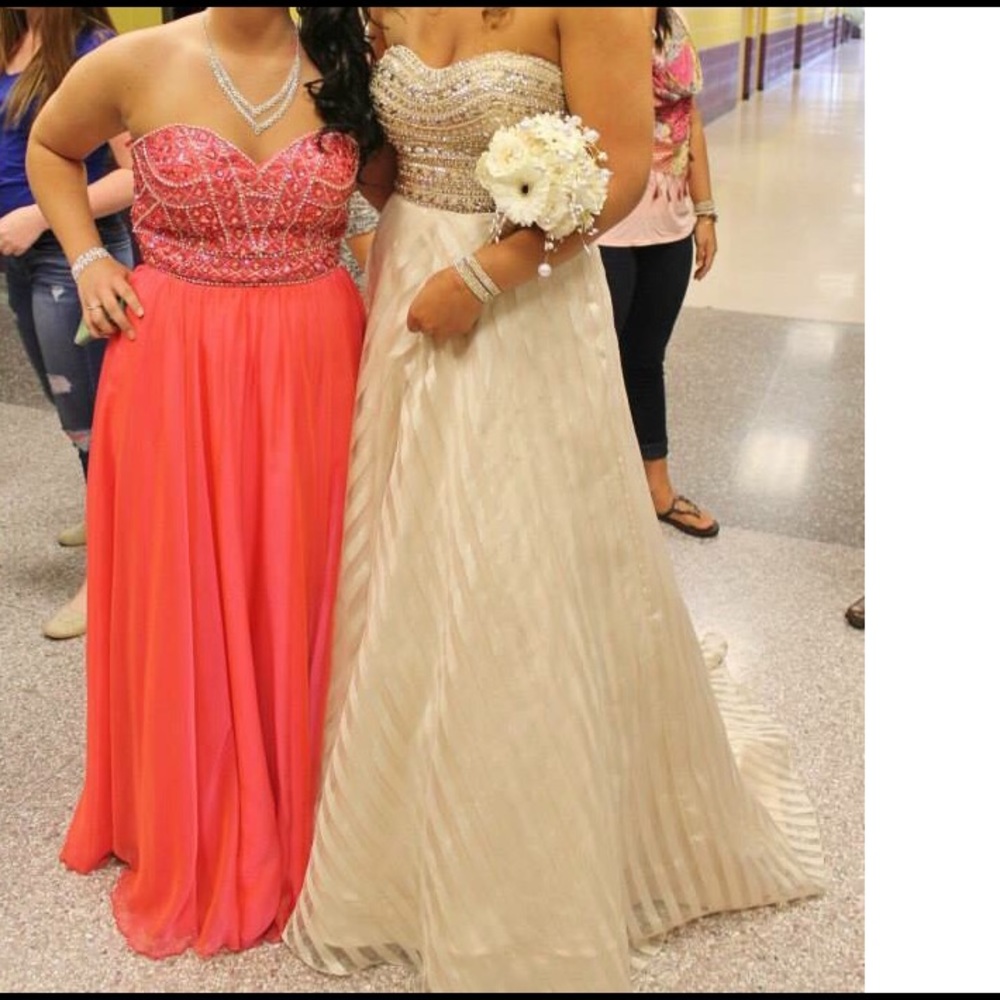 Gold MacDuggal dress.