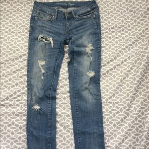 American Eagle distressed skinny jeans.