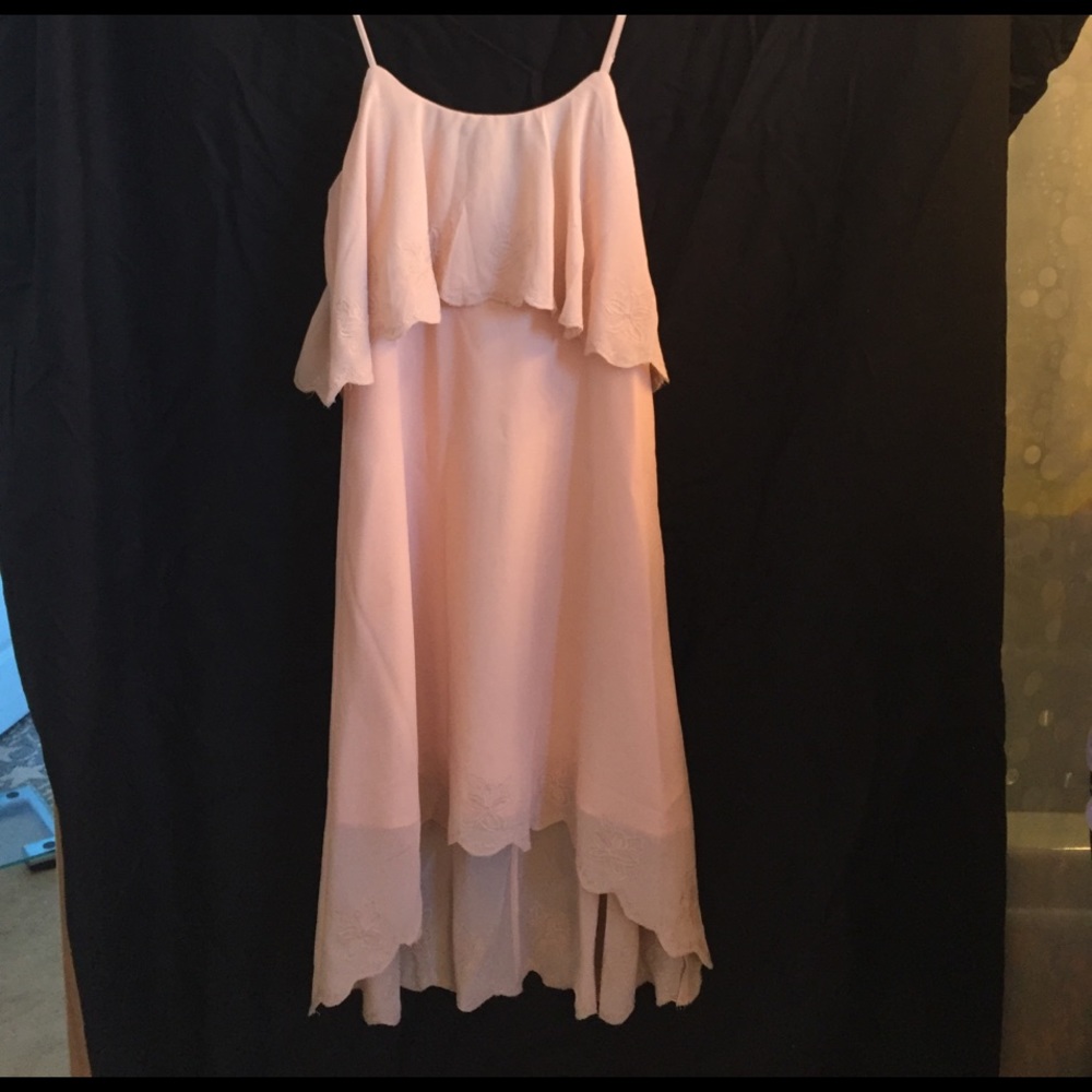 Brand New with Tags. Never worn. Size Medium.
