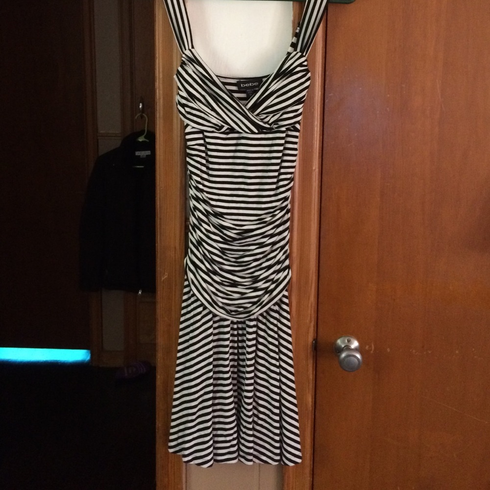 Bebe dress, adjustable shoulders. Sexy fit