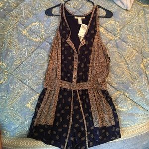 "Life in Progress" brand navy/tan printed romper