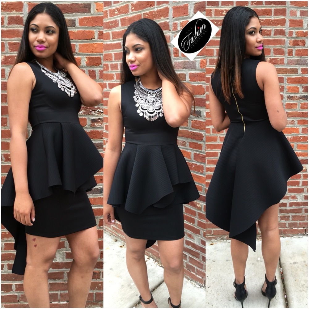 Peplum dress in Black
