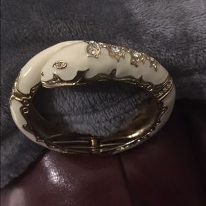 Snake design fashion bracelet with CZ stones.