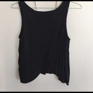 Black tank top with a cut in the back