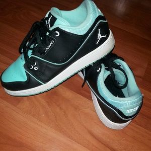 Black and mint green Jordans