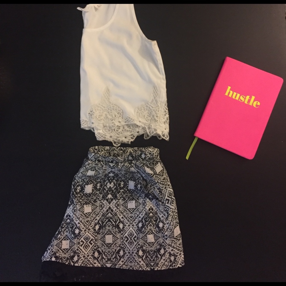 Super chic flowy shorts. With lace detail