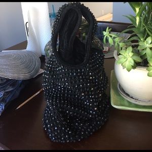 Express Black beaded hobo bag.